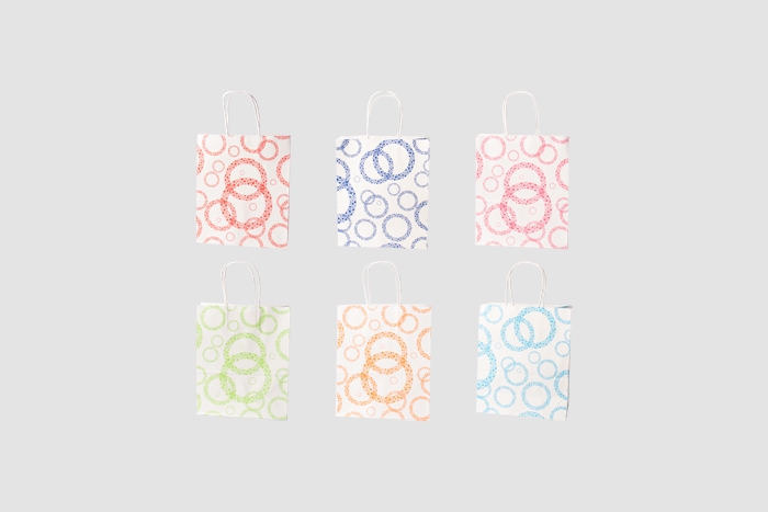 Сумочка подарочная крафт 27х22х11см К GYH913-51 микс