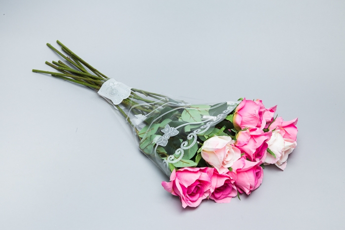 Пакет цветочный Рюмка 30/40 Бант цветной рисунок белый 50 шт Пакет цветочный Рюмка 30/40 Бант цветной рисунок белый 50 шт